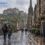 Coppia con ombrello sulla Royal Mile bagnata, con il Castello di Edimburgo sullo sfondo